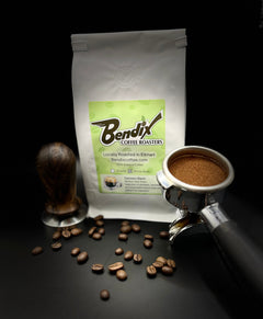 White Bendix coffee bag with a portafilter and scattered beans — Bendix Espresso Medium-Dark Roast Coffee gallery