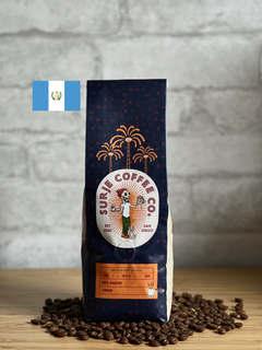 Surje coffee packaging with a Guatemala flag