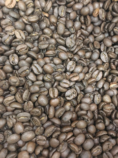 Close-up of roasted beans accompanying Southern Star Bourbon Infused coffee