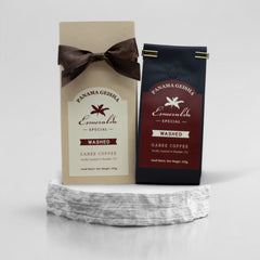 Panama Geisha washed coffee packaging on a stone pedestal