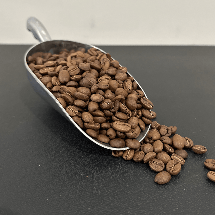 Bag of specialty roast coffee from Origin Unknown with notes of Chocolate