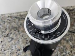 Top view of the DF54 stepless grind adjustment collar and hopper