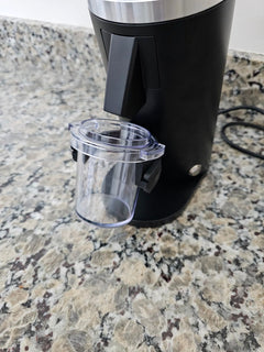 DF54 exit chute, dosing cup and adjustable cup support close-up
